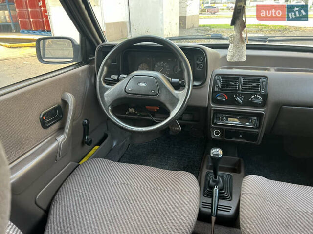 Бежевий Форд Ескорт, об'ємом двигуна 1.4 л та пробігом 150 тис. км за 880 $, фото 18 на Automoto.ua