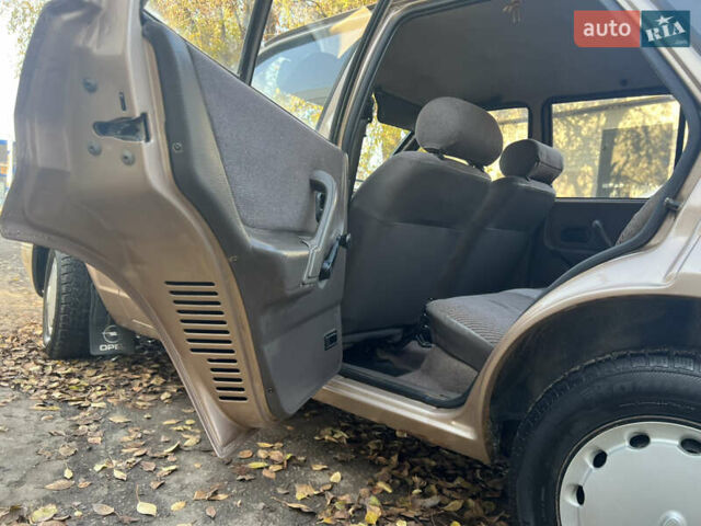 Бежевий Форд Ескорт, об'ємом двигуна 1.4 л та пробігом 150 тис. км за 880 $, фото 15 на Automoto.ua