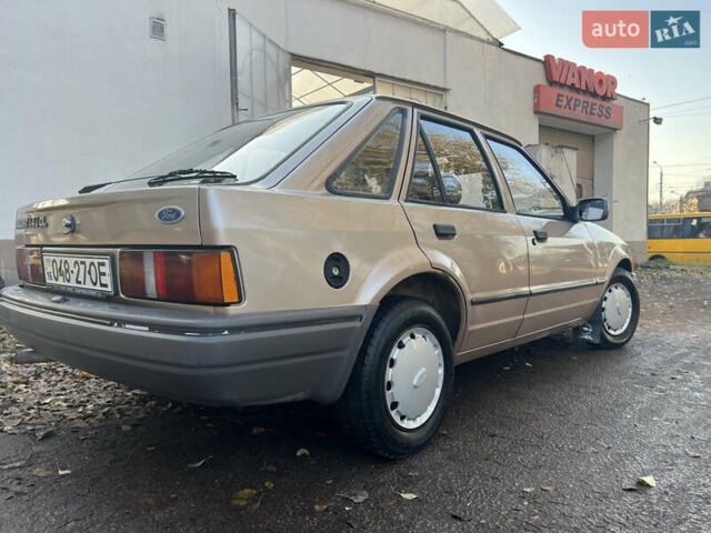 Бежевий Форд Ескорт, об'ємом двигуна 1.4 л та пробігом 150 тис. км за 880 $, фото 10 на Automoto.ua