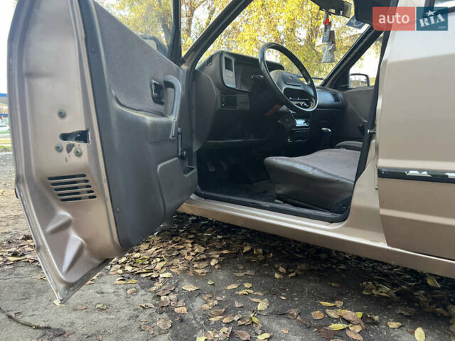 Бежевий Форд Ескорт, об'ємом двигуна 1.4 л та пробігом 150 тис. км за 880 $, фото 13 на Automoto.ua