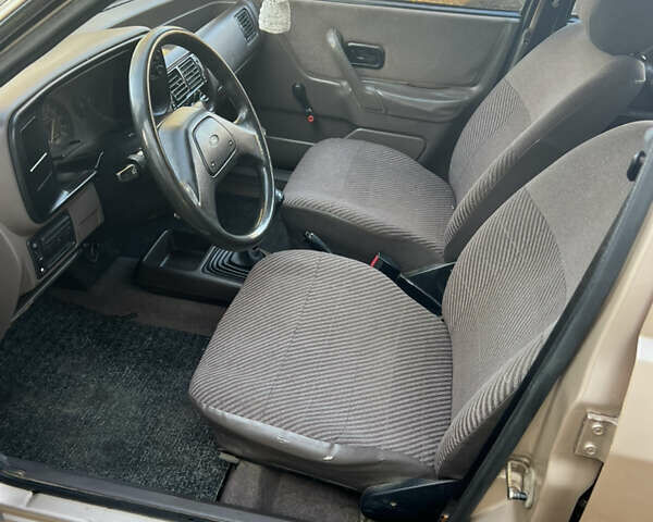Бежевий Форд Ескорт, об'ємом двигуна 1.4 л та пробігом 150 тис. км за 880 $, фото 14 на Automoto.ua