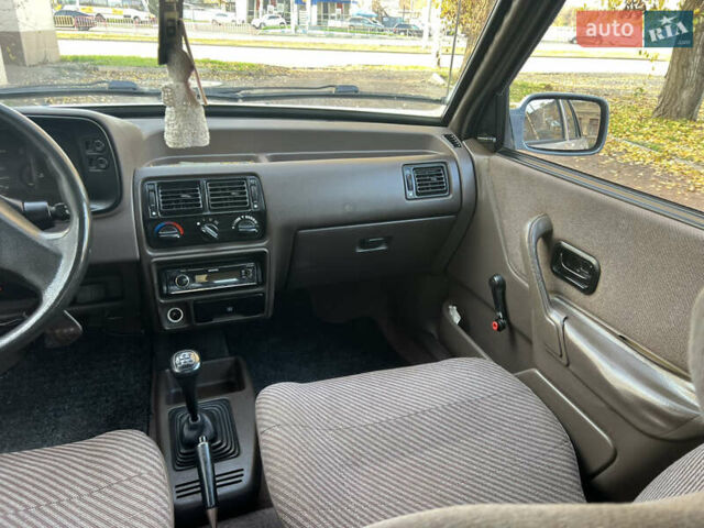 Бежевий Форд Ескорт, об'ємом двигуна 1.4 л та пробігом 150 тис. км за 880 $, фото 19 на Automoto.ua