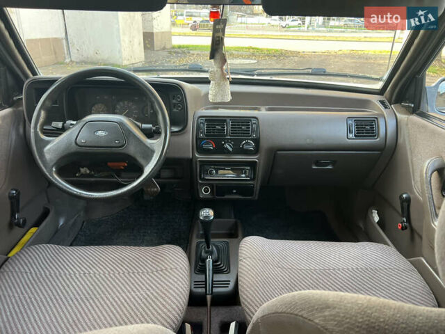 Бежевий Форд Ескорт, об'ємом двигуна 1.4 л та пробігом 150 тис. км за 880 $, фото 17 на Automoto.ua