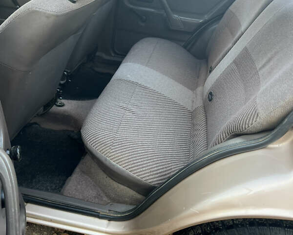 Бежевий Форд Ескорт, об'ємом двигуна 1.4 л та пробігом 150 тис. км за 880 $, фото 16 на Automoto.ua