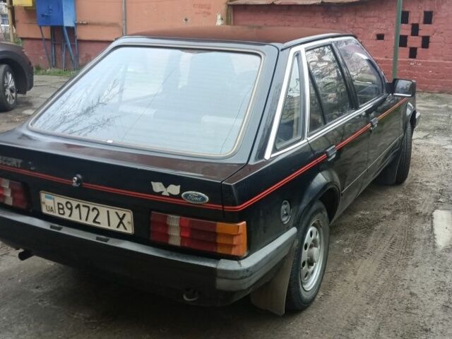 Черный Форд Эскорт, объемом двигателя 1.3 л и пробегом 200 тыс. км за 593 $, фото 2 на Automoto.ua