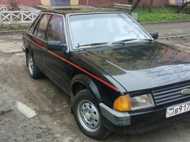 Черный Форд Эскорт, объемом двигателя 1.3 л и пробегом 200 тыс. км за 593 $, фото 3 на Automoto.ua