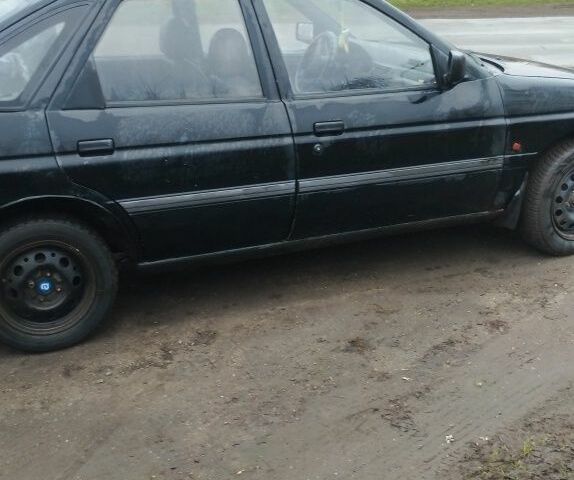 Черный Форд Эскорт, объемом двигателя 1.8 л и пробегом 60 тыс. км за 805 $, фото 2 на Automoto.ua