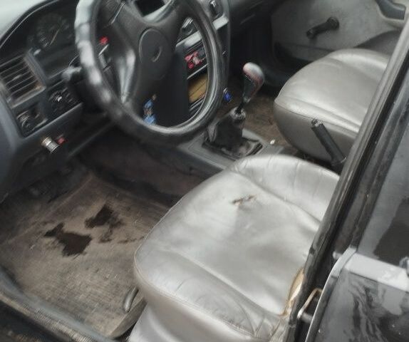 Черный Форд Эскорт, объемом двигателя 1.8 л и пробегом 60 тыс. км за 805 $, фото 4 на Automoto.ua