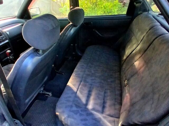 Черный Форд Эскорт, объемом двигателя 1.3 л и пробегом 487 тыс. км за 650 $, фото 5 на Automoto.ua