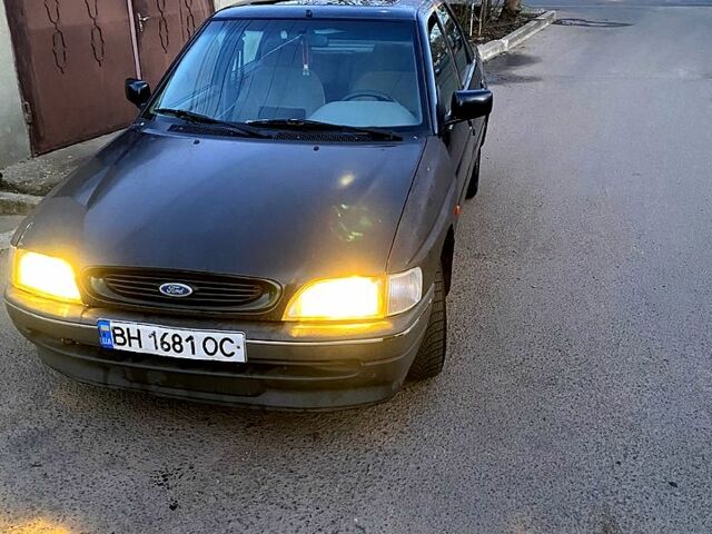 Чорний Форд Ескорт, об'ємом двигуна 1.8 л та пробігом 99 тис. км за 1149 $, фото 1 на Automoto.ua