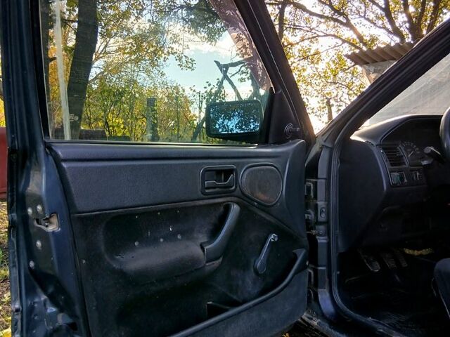 Черный Форд Эскорт, объемом двигателя 1.3 л и пробегом 487 тыс. км за 650 $, фото 4 на Automoto.ua