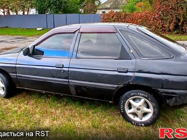 Черный Форд Эскорт, объемом двигателя 1.3 л и пробегом 487 тыс. км за 650 $, фото 2 на Automoto.ua