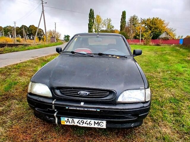 Черный Форд Эскорт, объемом двигателя 1.3 л и пробегом 487 тыс. км за 650 $, фото 1 на Automoto.ua