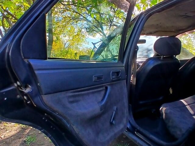 Черный Форд Эскорт, объемом двигателя 1.3 л и пробегом 487 тыс. км за 650 $, фото 7 на Automoto.ua