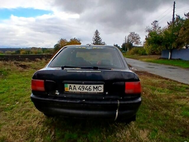 Черный Форд Эскорт, объемом двигателя 1.3 л и пробегом 487 тыс. км за 650 $, фото 3 на Automoto.ua