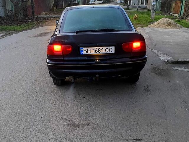 Черный Форд Эскорт, объемом двигателя 1.8 л и пробегом 99 тыс. км за 1149 $, фото 3 на Automoto.ua