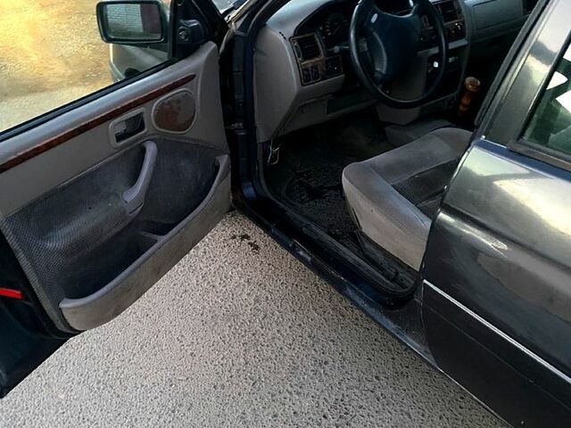 Чорний Форд Ескорт, об'ємом двигуна 1.8 л та пробігом 99 тис. км за 1149 $, фото 5 на Automoto.ua