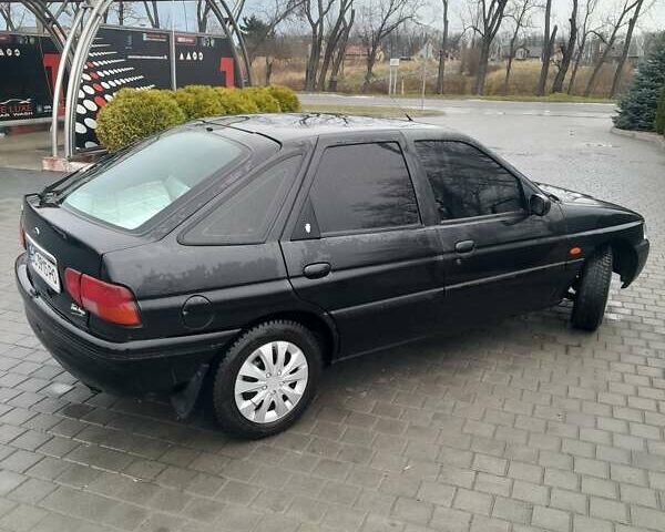 Черный Форд Эскорт, объемом двигателя 1.4 л и пробегом 350 тыс. км за 1450 $, фото 5 на Automoto.ua