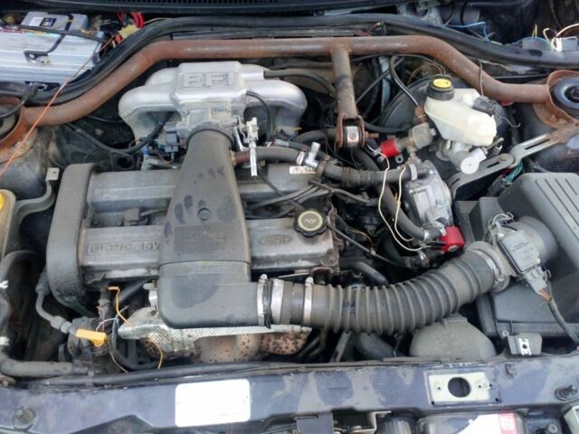 Черный Форд Эскорт, объемом двигателя 2 л и пробегом 1 тыс. км за 1600 $, фото 6 на Automoto.ua