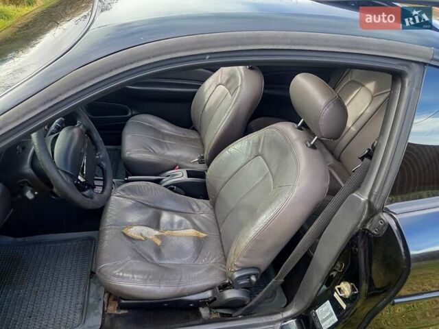 Черный Форд Эскорт, объемом двигателя 2 л и пробегом 147 тыс. км за 2000 $, фото 5 на Automoto.ua