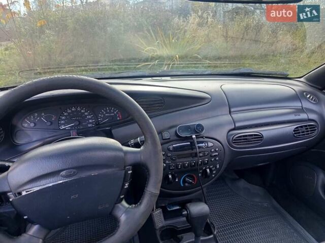 Черный Форд Эскорт, объемом двигателя 2 л и пробегом 147 тыс. км за 2000 $, фото 4 на Automoto.ua