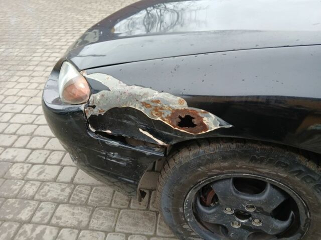 Черный Форд Эскорт, объемом двигателя 2 л и пробегом 149 тыс. км за 2200 $, фото 12 на Automoto.ua