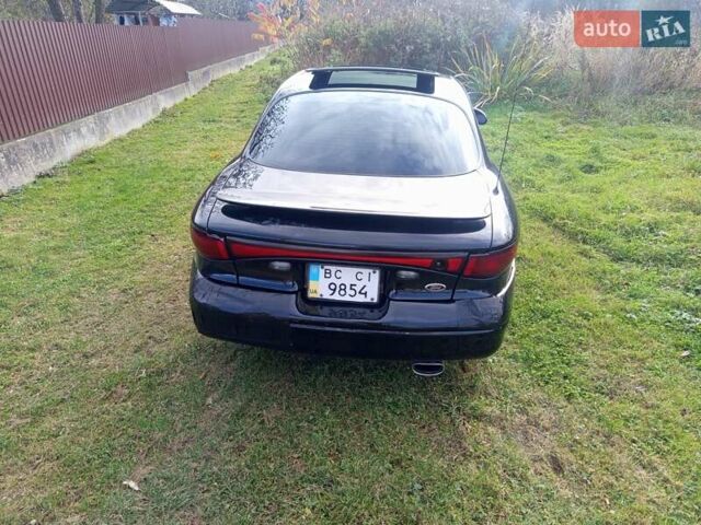 Черный Форд Эскорт, объемом двигателя 2 л и пробегом 147 тыс. км за 2000 $, фото 6 на Automoto.ua