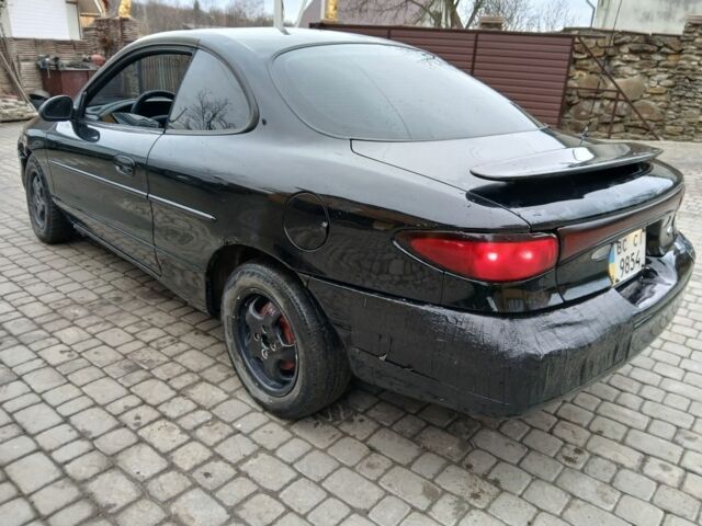 Черный Форд Эскорт, объемом двигателя 2 л и пробегом 149 тыс. км за 2200 $, фото 5 на Automoto.ua