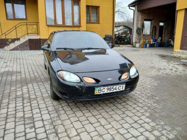 Черный Форд Эскорт, объемом двигателя 2 л и пробегом 149 тыс. км за 2200 $, фото 1 на Automoto.ua