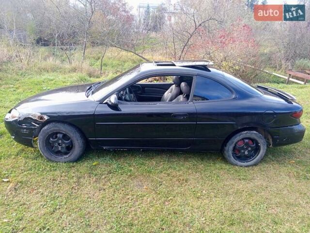 Черный Форд Эскорт, объемом двигателя 2 л и пробегом 147 тыс. км за 2000 $, фото 2 на Automoto.ua