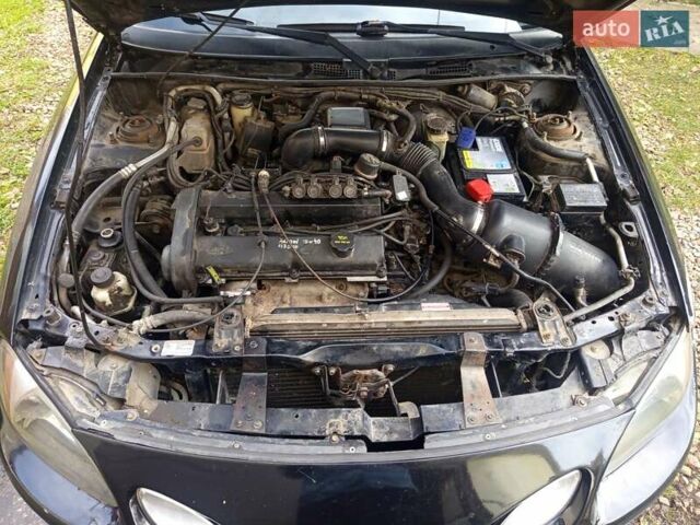 Черный Форд Эскорт, объемом двигателя 2 л и пробегом 147 тыс. км за 2000 $, фото 11 на Automoto.ua