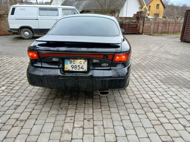 Черный Форд Эскорт, объемом двигателя 2 л и пробегом 149 тыс. км за 2200 $, фото 4 на Automoto.ua