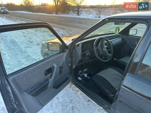 Черный Форд Эскорт, объемом двигателя 1.4 л и пробегом 342 тыс. км за 800 $, фото 11 на Automoto.ua
