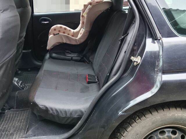 Черный Форд Эскорт, объемом двигателя 1.8 л и пробегом 65 тыс. км за 1800 $, фото 5 на Automoto.ua