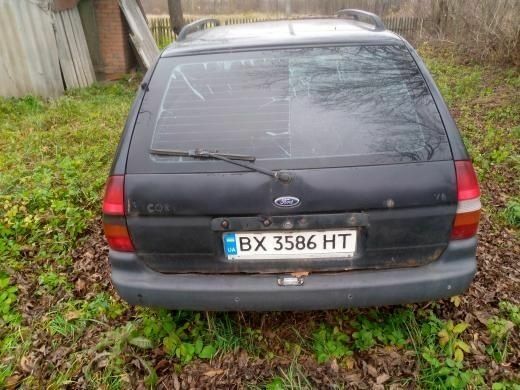 Черный Форд Эскорт, объемом двигателя 1.4 л и пробегом 200 тыс. км за 700 $, фото 3 на Automoto.ua