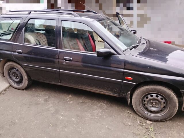 Черный Форд Эскорт, объемом двигателя 1.8 л и пробегом 65 тыс. км за 1800 $, фото 2 на Automoto.ua