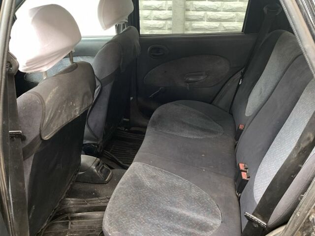 Чорний Форд Ескорт, об'ємом двигуна 1.8 л та пробігом 390 тис. км за 1550 $, фото 5 на Automoto.ua