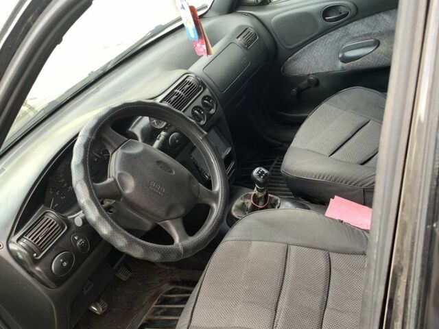 Чорний Форд Ескорт, об'ємом двигуна 1.8 л та пробігом 390 тис. км за 1550 $, фото 4 на Automoto.ua