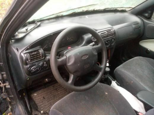 Черный Форд Эскорт, объемом двигателя 1.4 л и пробегом 200 тыс. км за 700 $, фото 1 на Automoto.ua