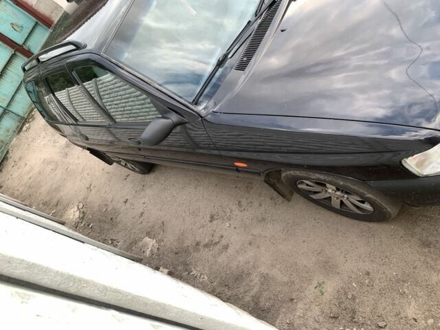 Чорний Форд Ескорт, об'ємом двигуна 1.8 л та пробігом 390 тис. км за 1550 $, фото 3 на Automoto.ua