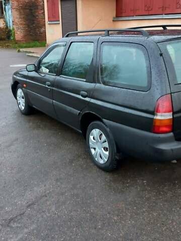 Черный Форд Эскорт, объемом двигателя 1.6 л и пробегом 349 тыс. км за 2000 $, фото 7 на Automoto.ua