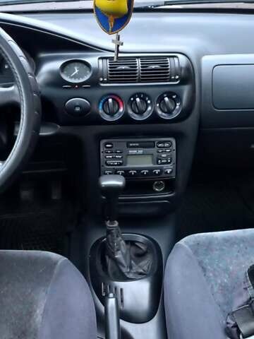 Черный Форд Эскорт, объемом двигателя 1.6 л и пробегом 349 тыс. км за 2000 $, фото 2 на Automoto.ua