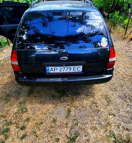 Чорний Форд Ескорт, об'ємом двигуна 1.6 л та пробігом 350 тис. км за 2200 $, фото 3 на Automoto.ua