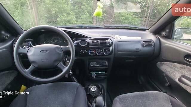 Фиолетовый Форд Эскорт, объемом двигателя 1.6 л и пробегом 270 тыс. км за 2000 $, фото 6 на Automoto.ua