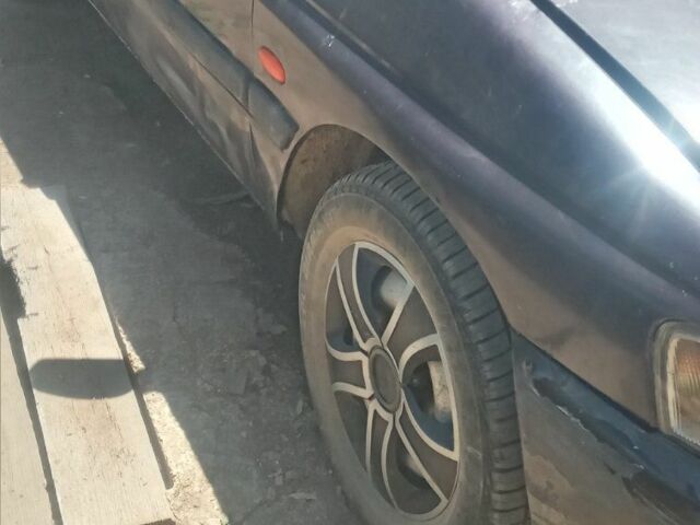 Фиолетовый Форд Эскорт, объемом двигателя 1.3 л и пробегом 90 тыс. км за 350 $, фото 2 на Automoto.ua