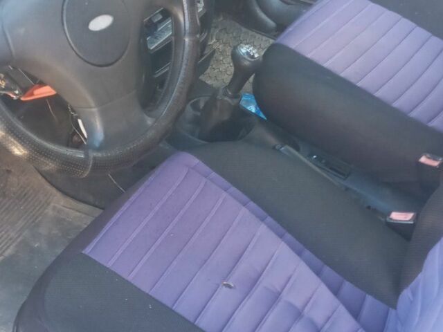 Фиолетовый Форд Эскорт, объемом двигателя 1.3 л и пробегом 90 тыс. км за 350 $, фото 7 на Automoto.ua