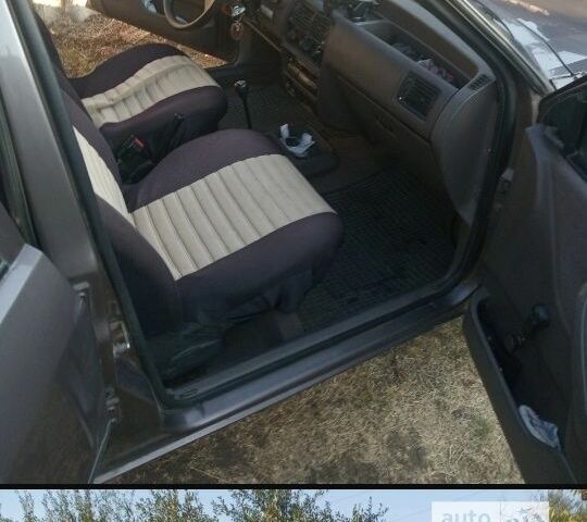 Коричневый Форд Эскорт, объемом двигателя 1.4 л и пробегом 100 тыс. км за 800 $, фото 6 на Automoto.ua