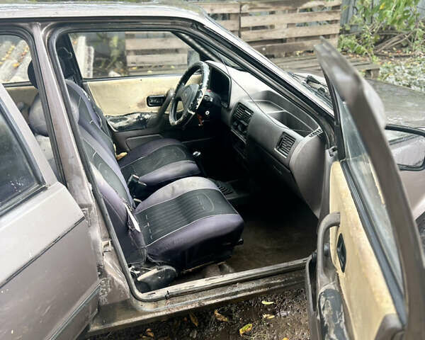 Коричневый Форд Эскорт, объемом двигателя 1.6 л и пробегом 99 тыс. км за 799 $, фото 5 на Automoto.ua