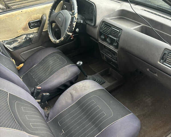 Коричневый Форд Эскорт, объемом двигателя 1.6 л и пробегом 99 тыс. км за 799 $, фото 3 на Automoto.ua