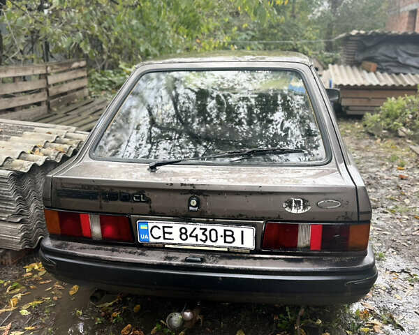 Коричневый Форд Эскорт, объемом двигателя 1.6 л и пробегом 99 тыс. км за 799 $, фото 4 на Automoto.ua